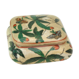 Candy decorated with foliage and butterflies