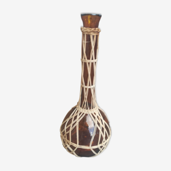 Glass and rattan vase