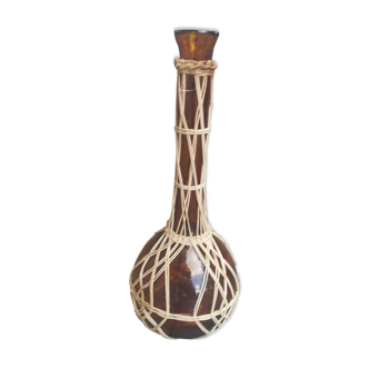 Glass and rattan vase