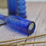 Set of 4 blue bottles of decoration