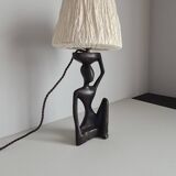 Ebony lamp with seated woman / 1930s