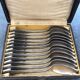 Series of 12 teaspoons in silver metal