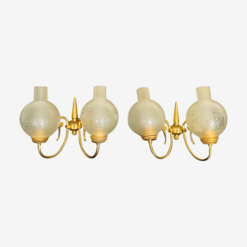 Wall lamps in brass and polished glass 70s