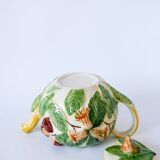 Tea service consisting of a teapot, a milk jug and a numbered hazelnut slip sugar bowl