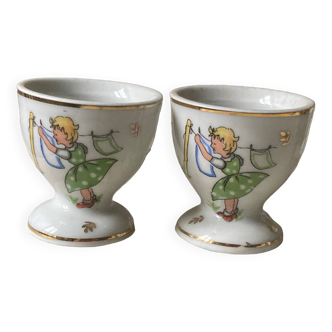 Lot de 2 coquetiers décorés en porcelaine