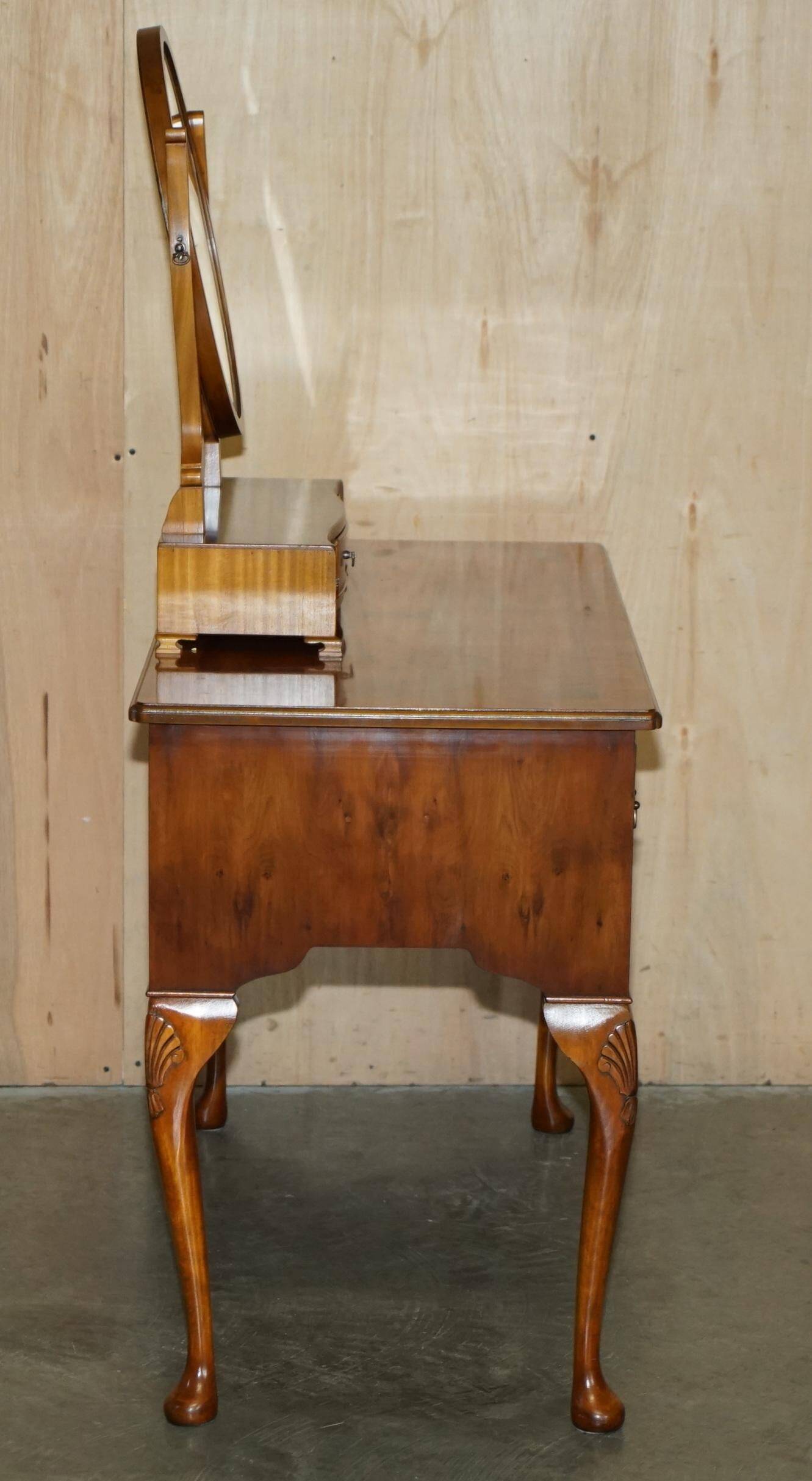 Vintage English walnut burr dressing table with mirror and chair.