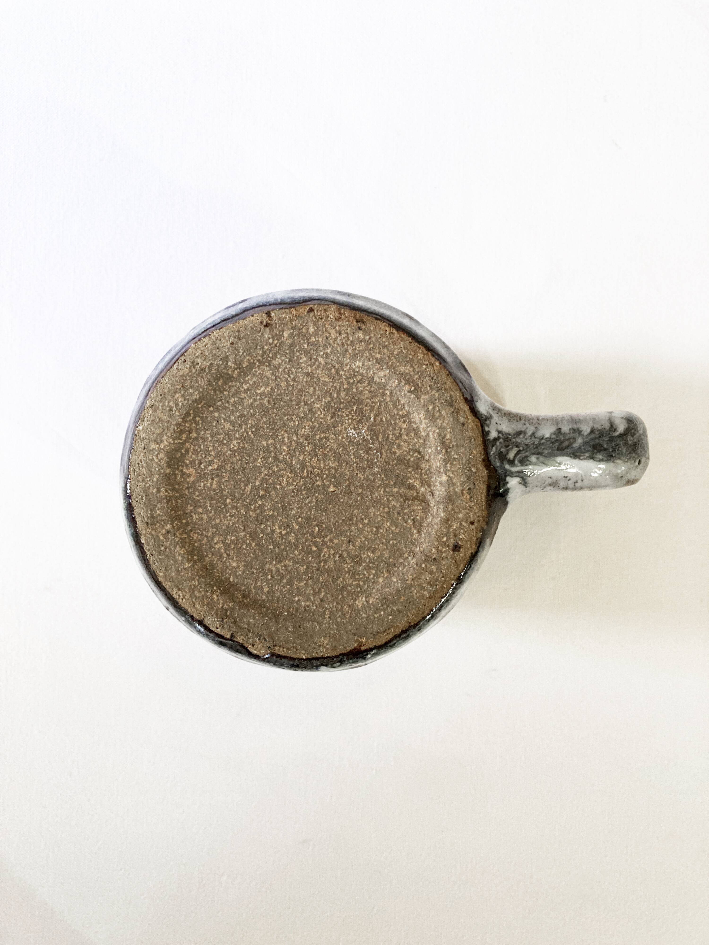 Trio of stoneware mugs