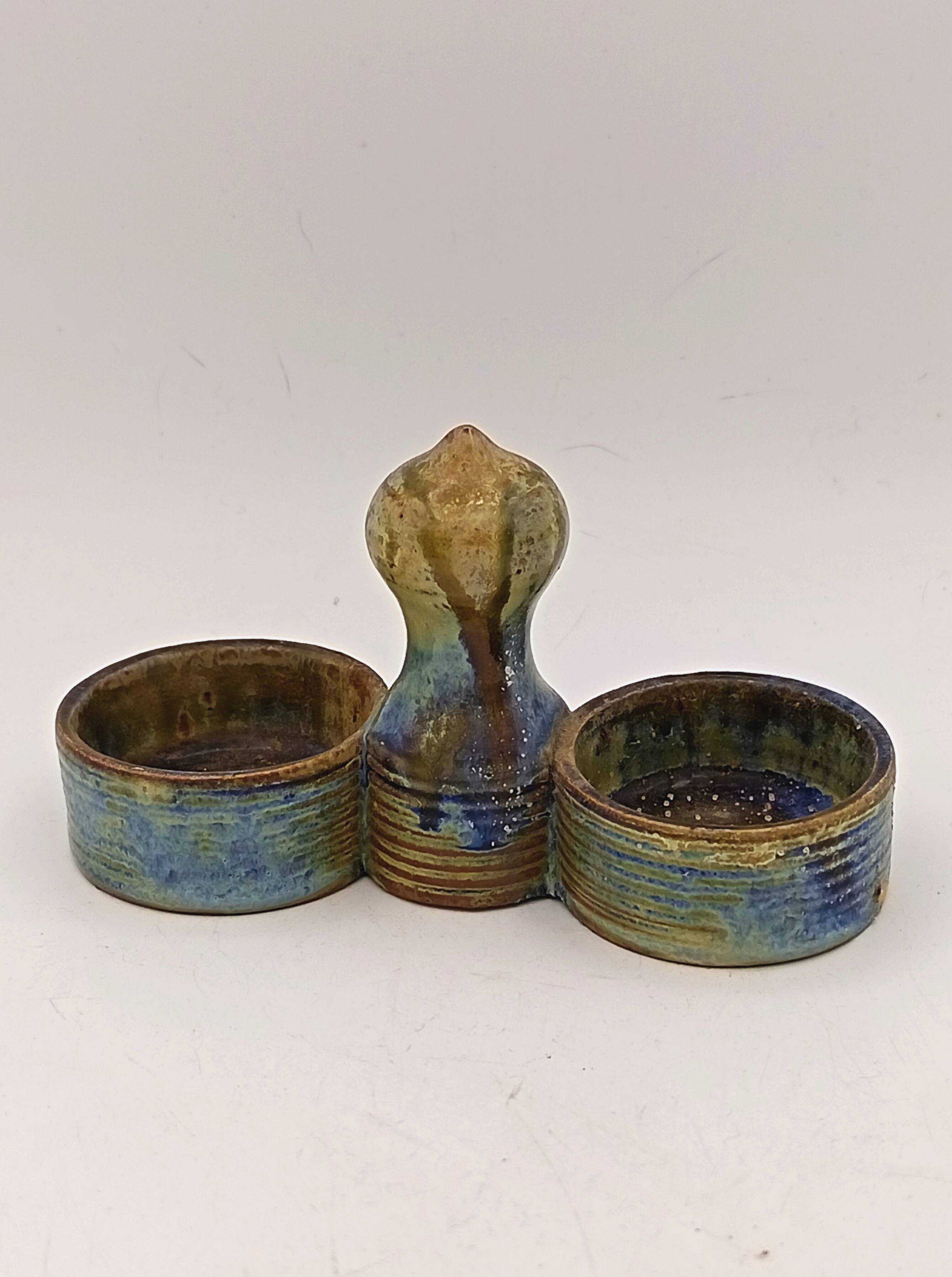 Glazed stoneware salt cellar signed Jean Maubrou.