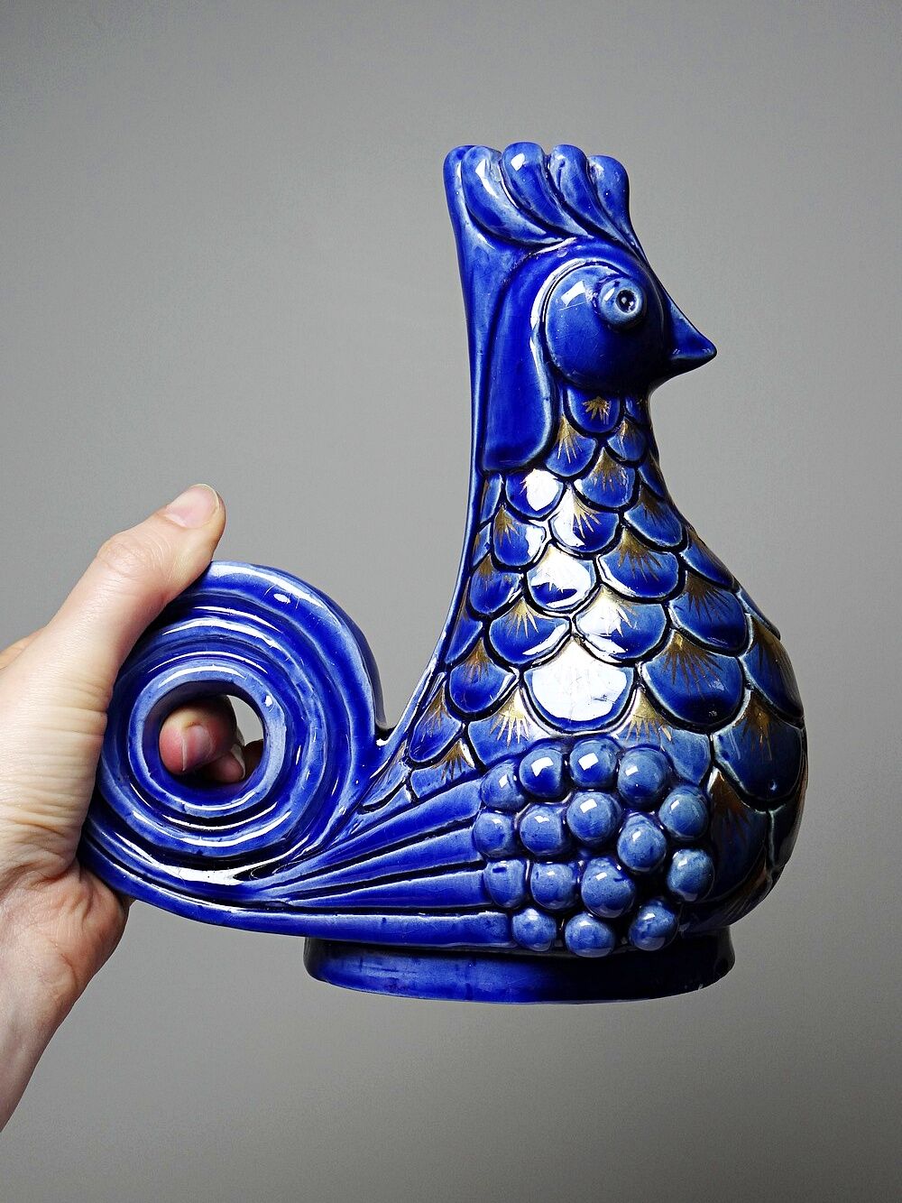Pair of ceramic glazed candlesticks in the shape of roosters, signed A.G Roger, year 1948.