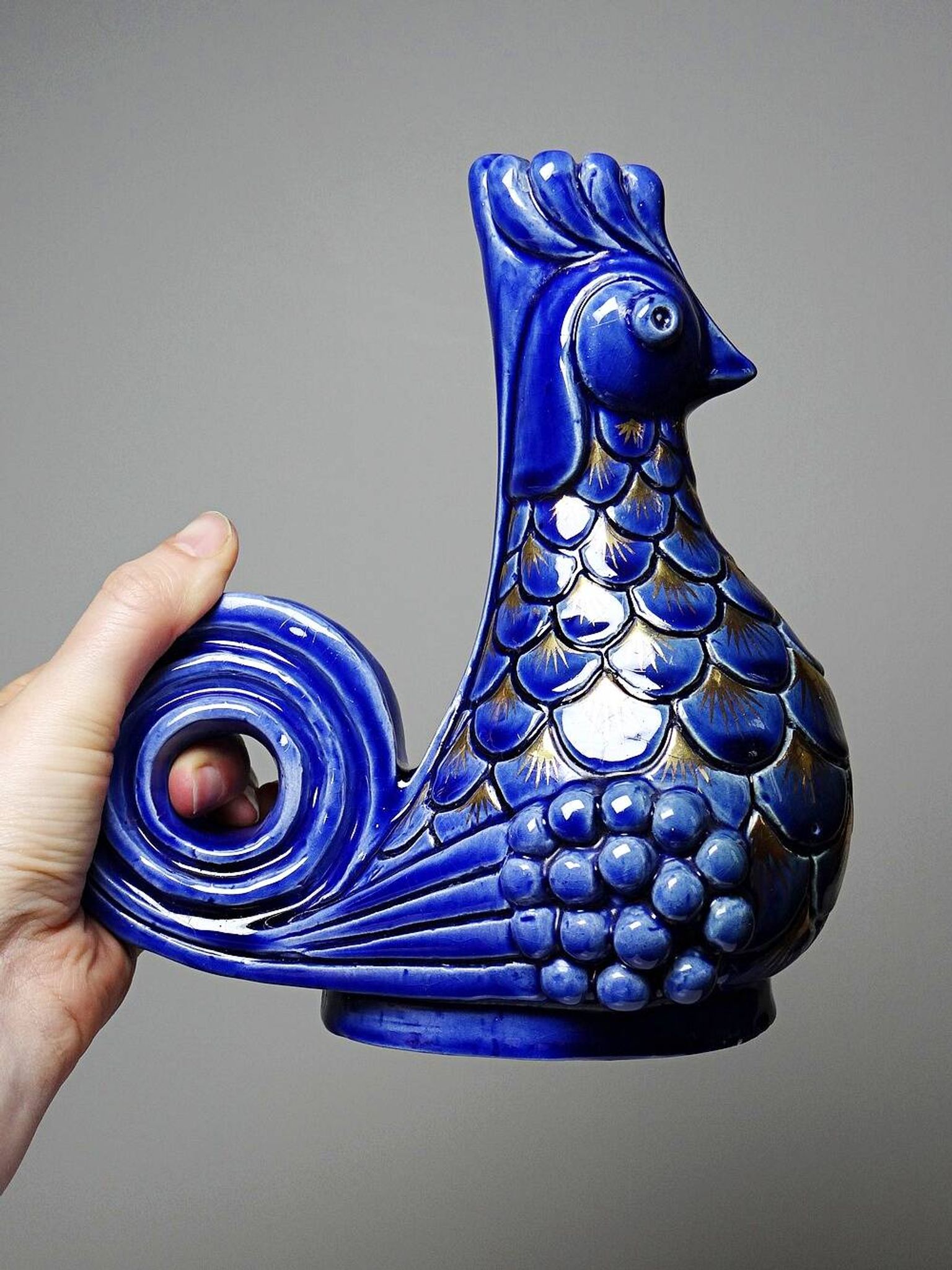 Pair of ceramic glazed candlesticks in the shape of roosters, signed A.G Roger, year 1948.