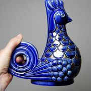 Pair of ceramic glazed candlesticks in the shape of roosters, signed A.G Roger, year 1948.