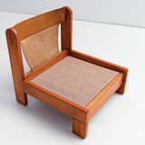 Low armchair in pine wood with bronze fabric