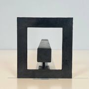 Paire de chenets modernistes en acier et fer forgé