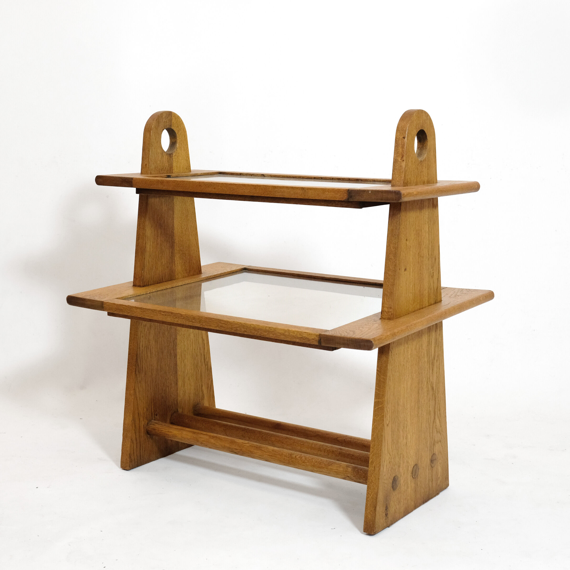 Served in oak and glass from the 50s and 60s.