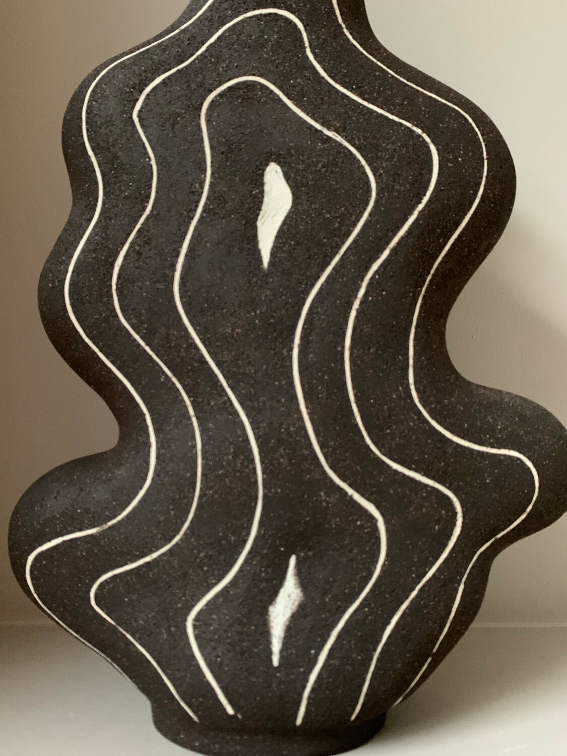 Raw black stoneware vase