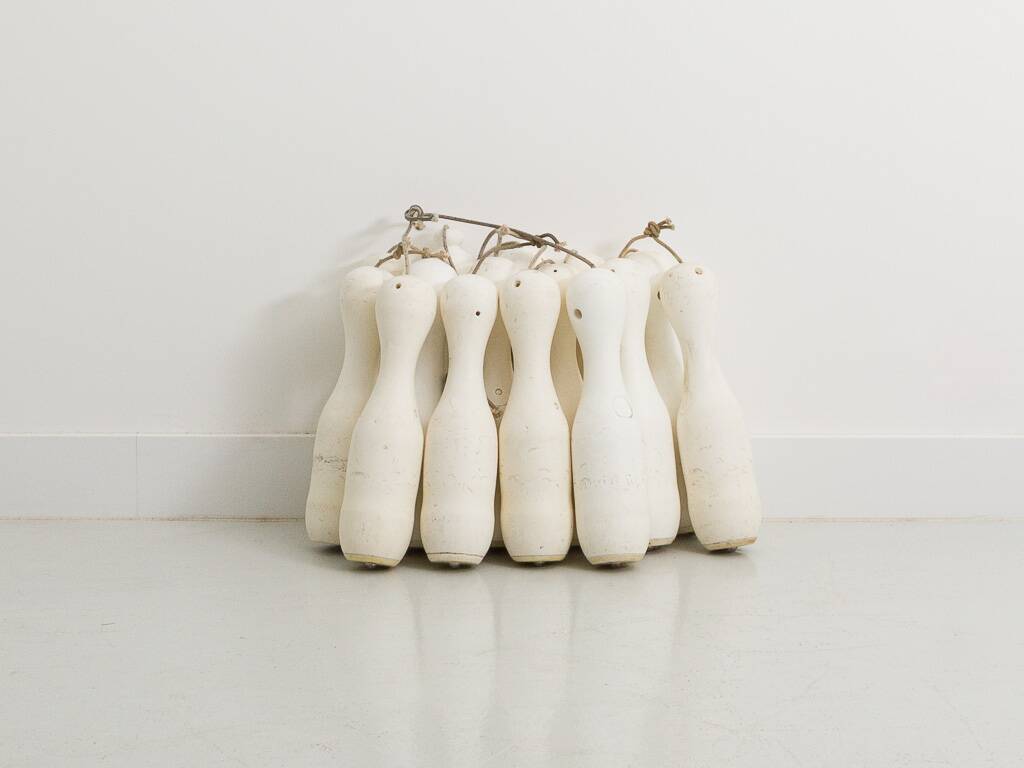 15 vintage bowling pins on nylon lifting cords