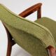 Fauteuil rétro en tissu boucle vert, forme ergonomique