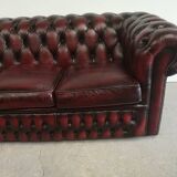 Three-seater chesterfield burgundy leather sofa