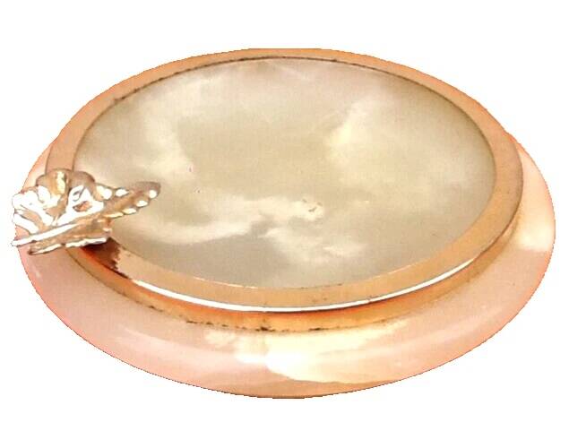 1970s Onyx ashtray with a gold metal rim.