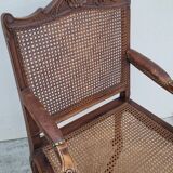 Louis XV Regency cane armchair leather armrests decorated with shell