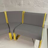 Yellow tubular modular bench & gray fabric