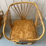 Pair of leather and bamboo armchairs