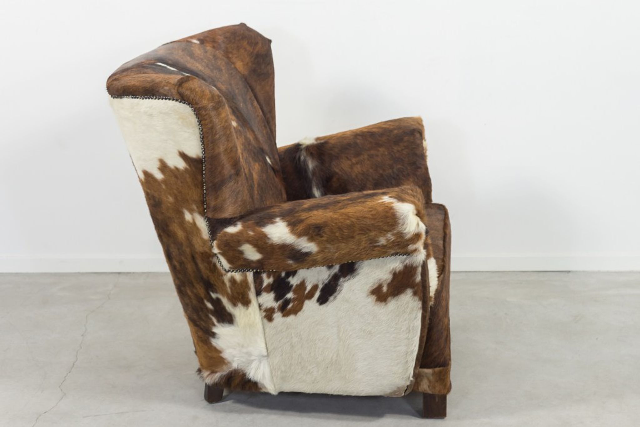 Fauteuil art déco en peau de vache