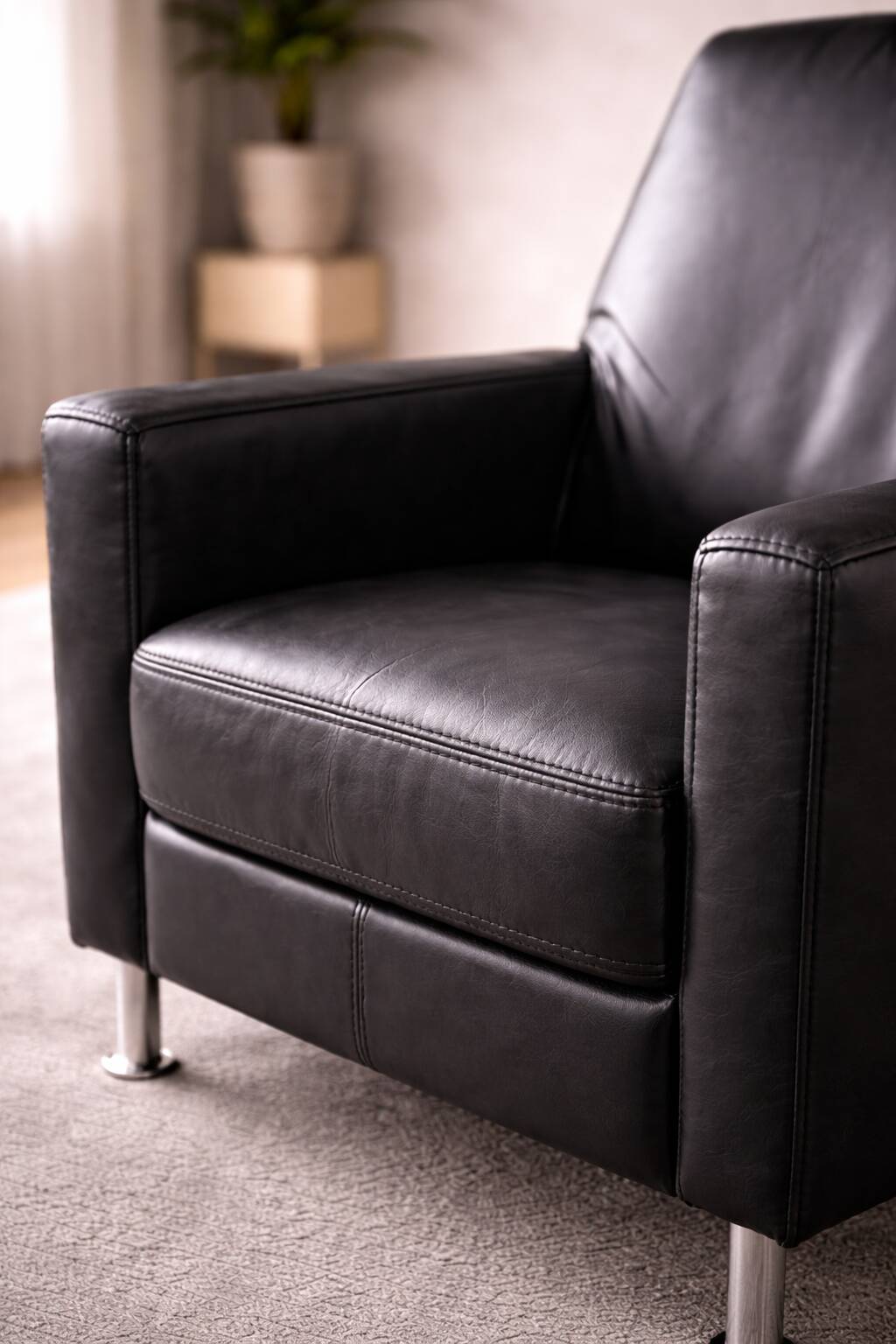 Modern Lounge Armchair with Matching Footstool — Black Leather