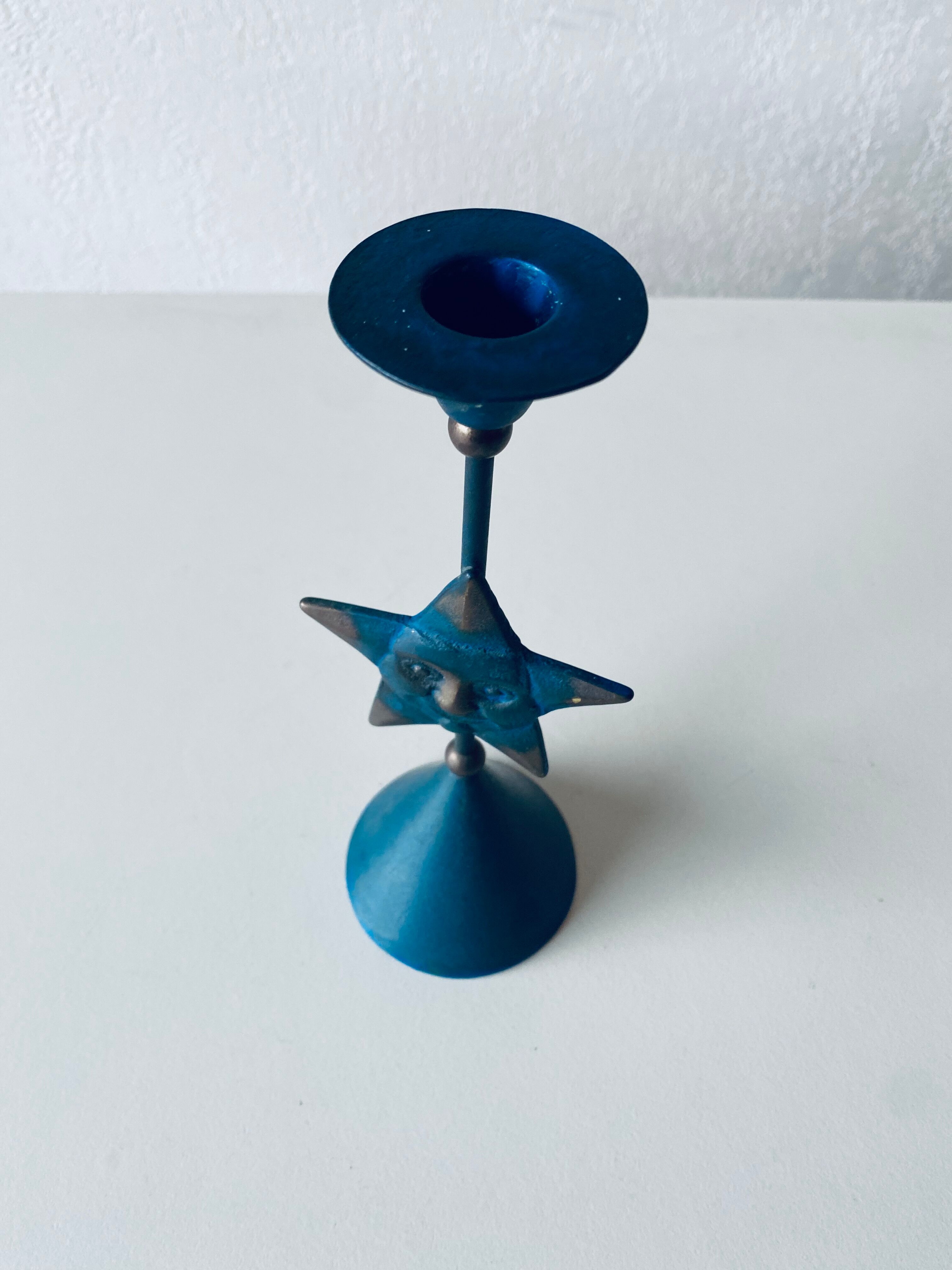 Metal star candle holder