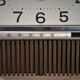 Wall clock features 4 Jewels 80s