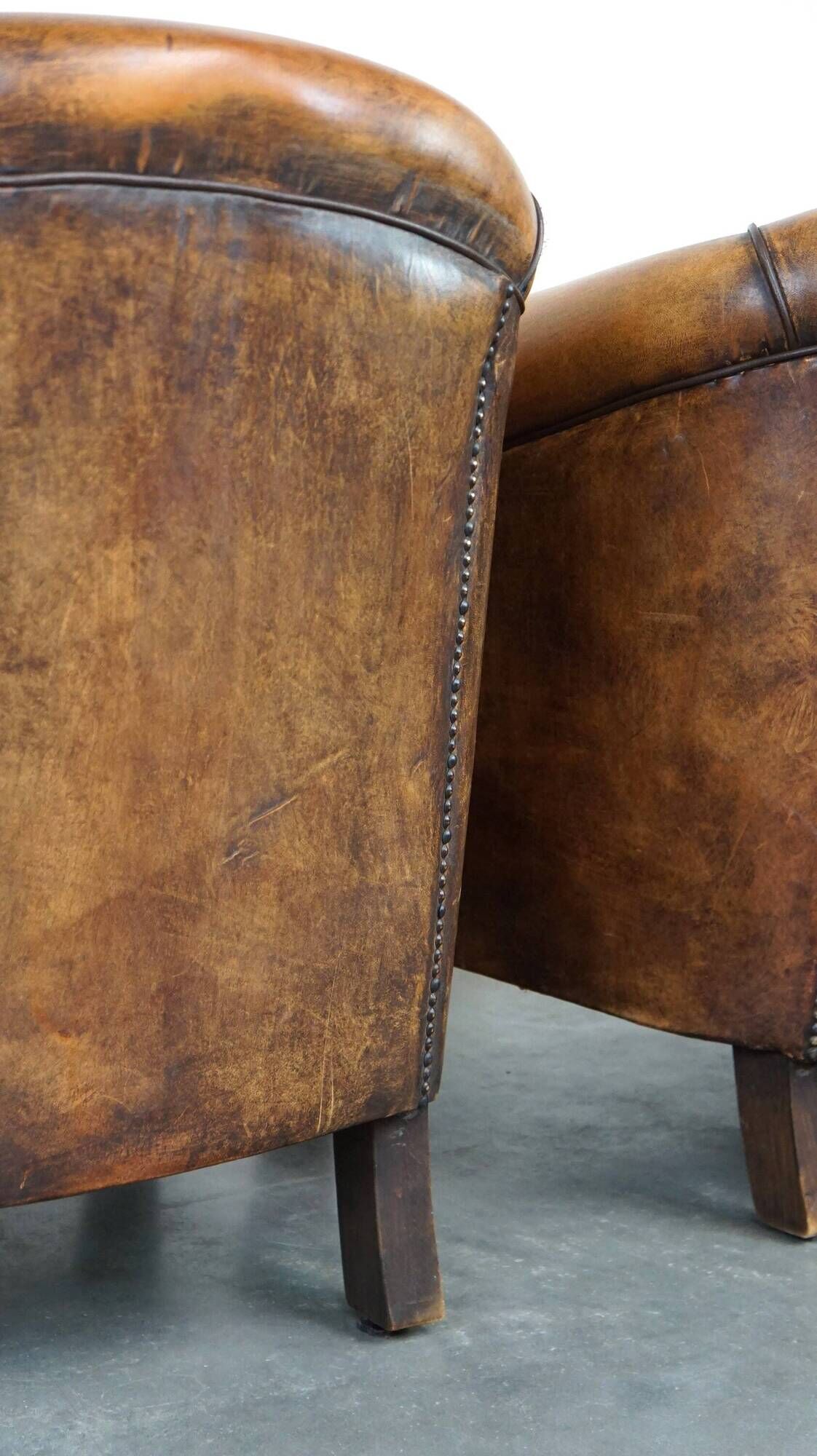 Set of 2 stylish yet beautiful and comfortable sheepskin club armchairs