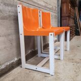 2 vintage orange Gautier monocoque chairs from 1960