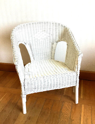 Vintage white rattan armchair