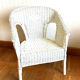 Vintage white rattan armchair