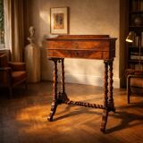 Antique wooden sewing table with drawer.