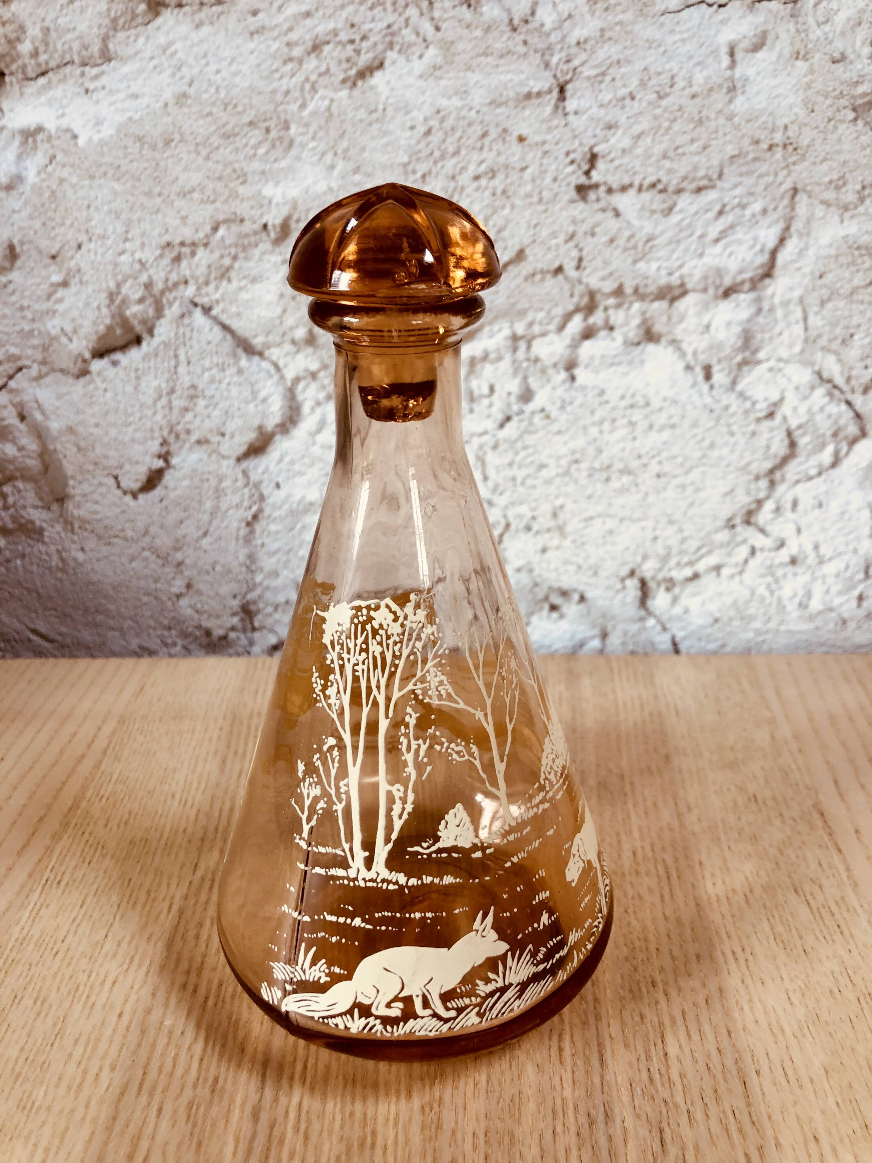 Vintage pink glass liqueur decanter