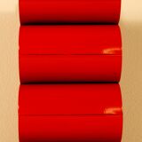 Red lacquered metal bottle holders