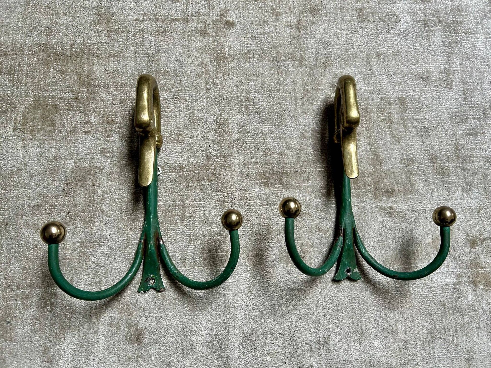 Rare set of swan neck coat hooks with mirror frame attributed to Maison Jansen, France, 1950s.