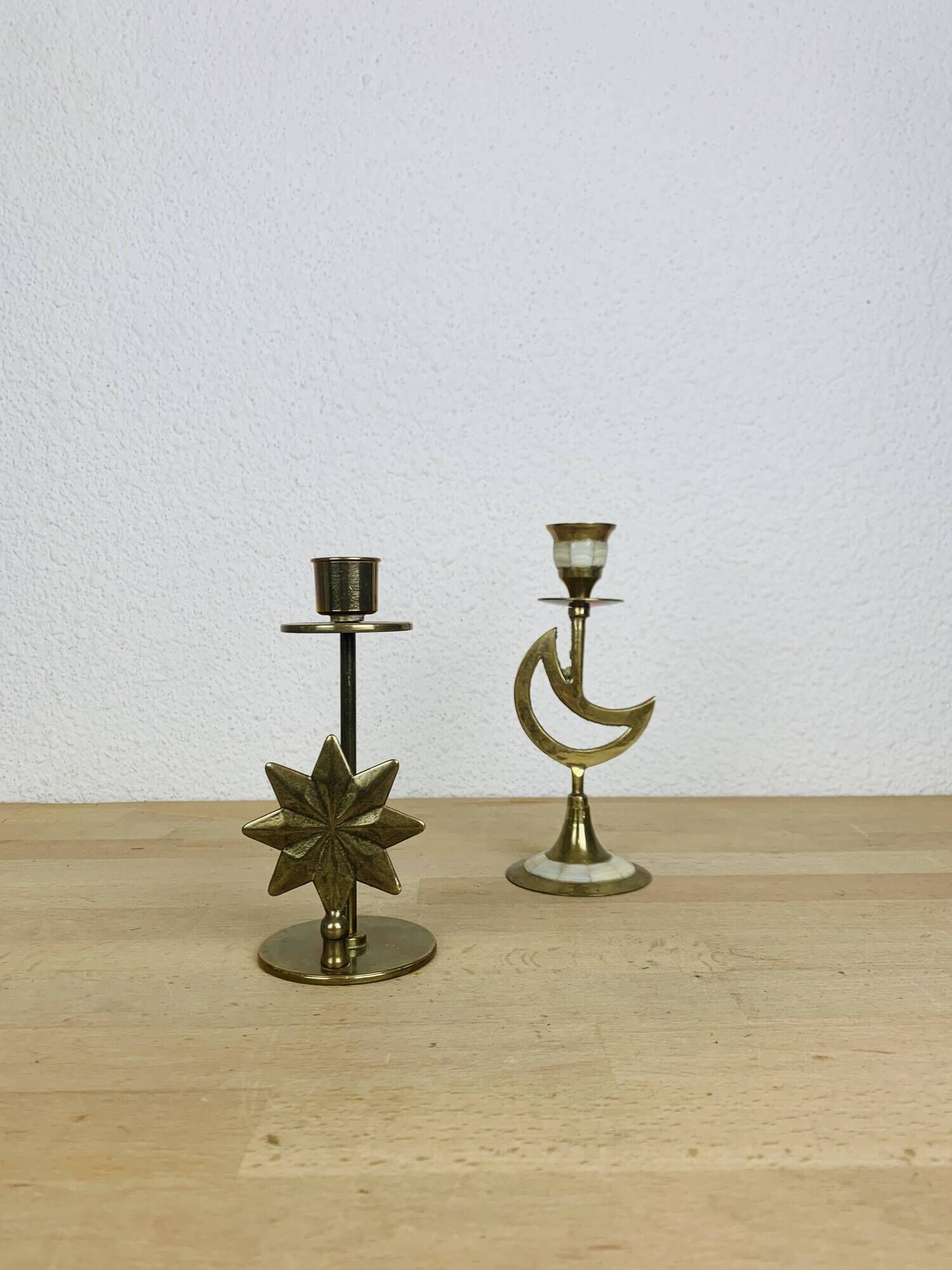 Pair of mother-of-pearl brass candlesticks with moon and sun