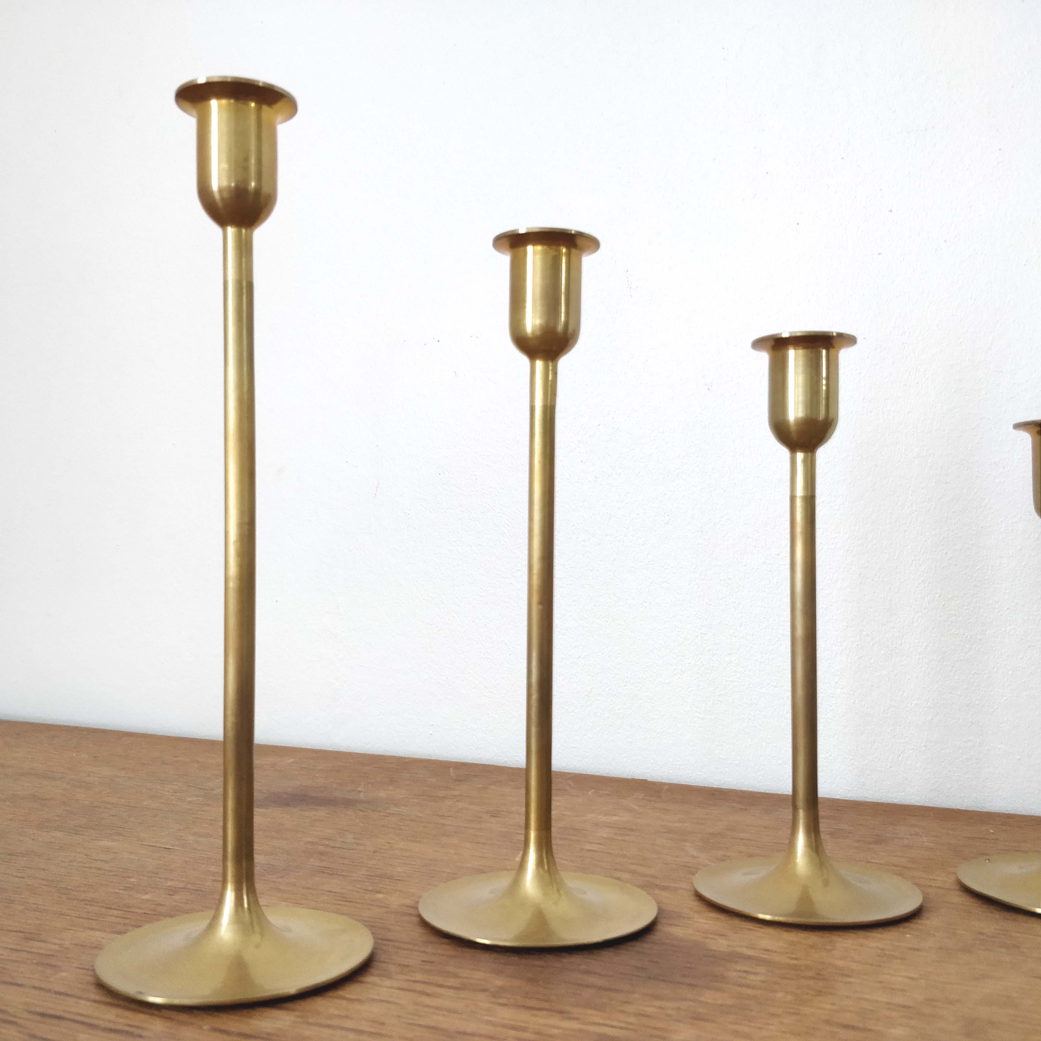 Set of 7 brass candlesticks