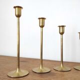 Set of 7 brass candlesticks
