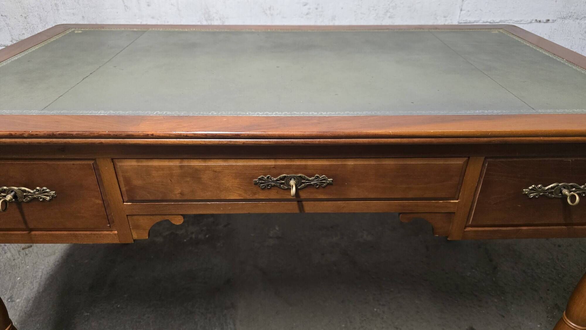 Flat leather desk, Louis-Philippe style, side pull-outs.