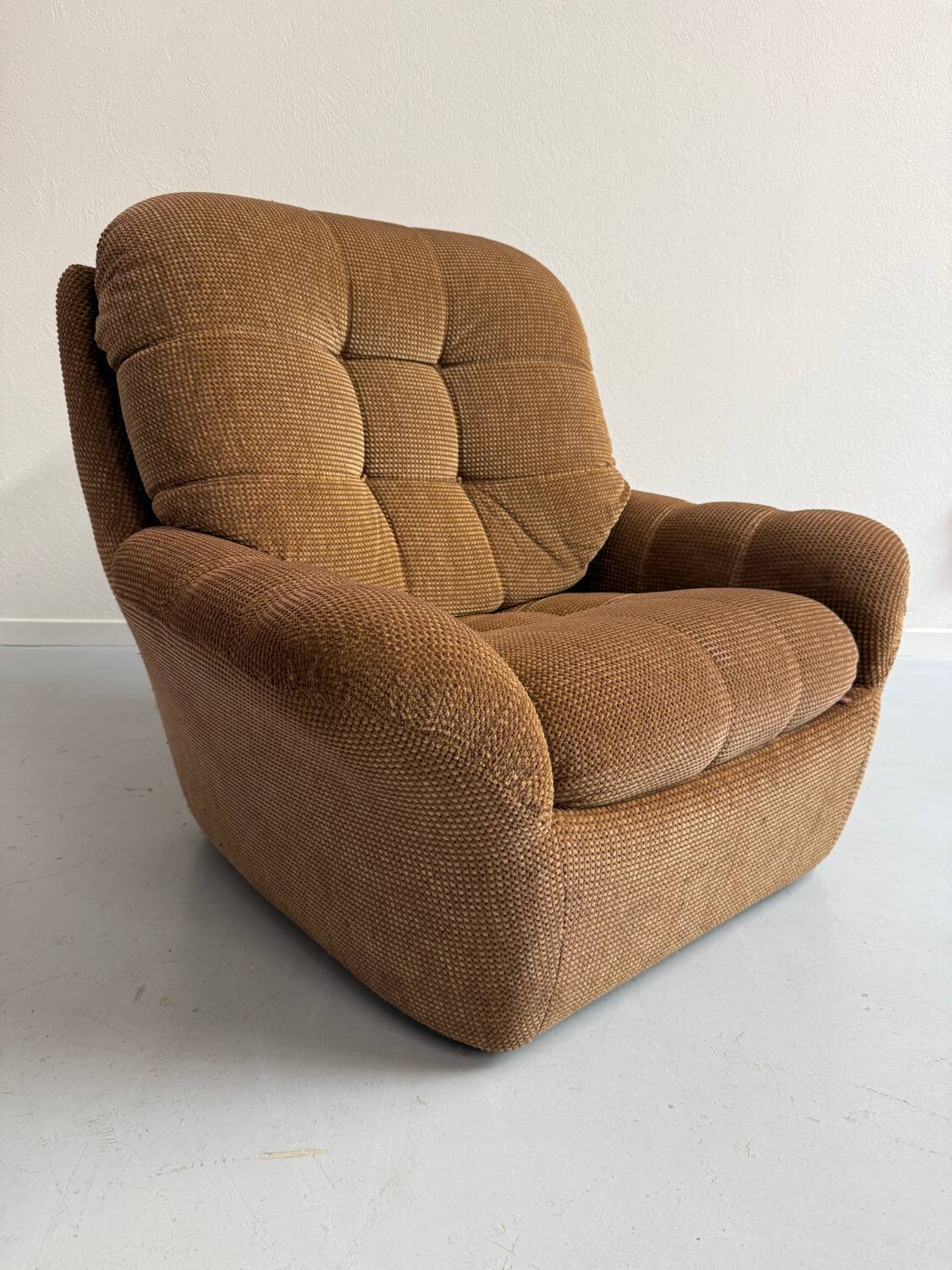 Old vintage 60s fabric lounge chair