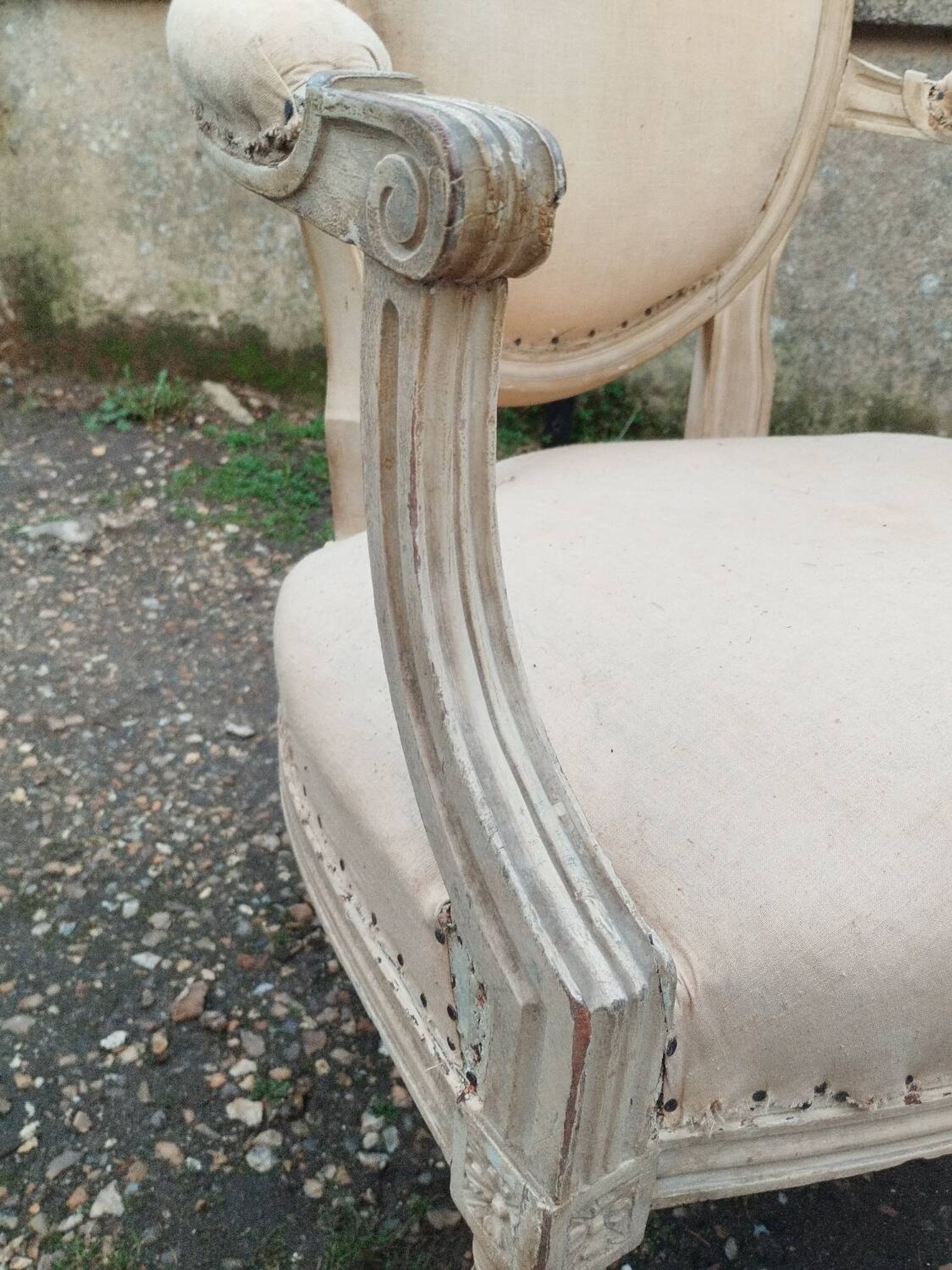 Antique armchair in Louis XVI style from the late 19th century.