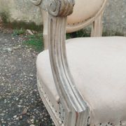 Antique armchair in Louis XVI style from the late 19th century.