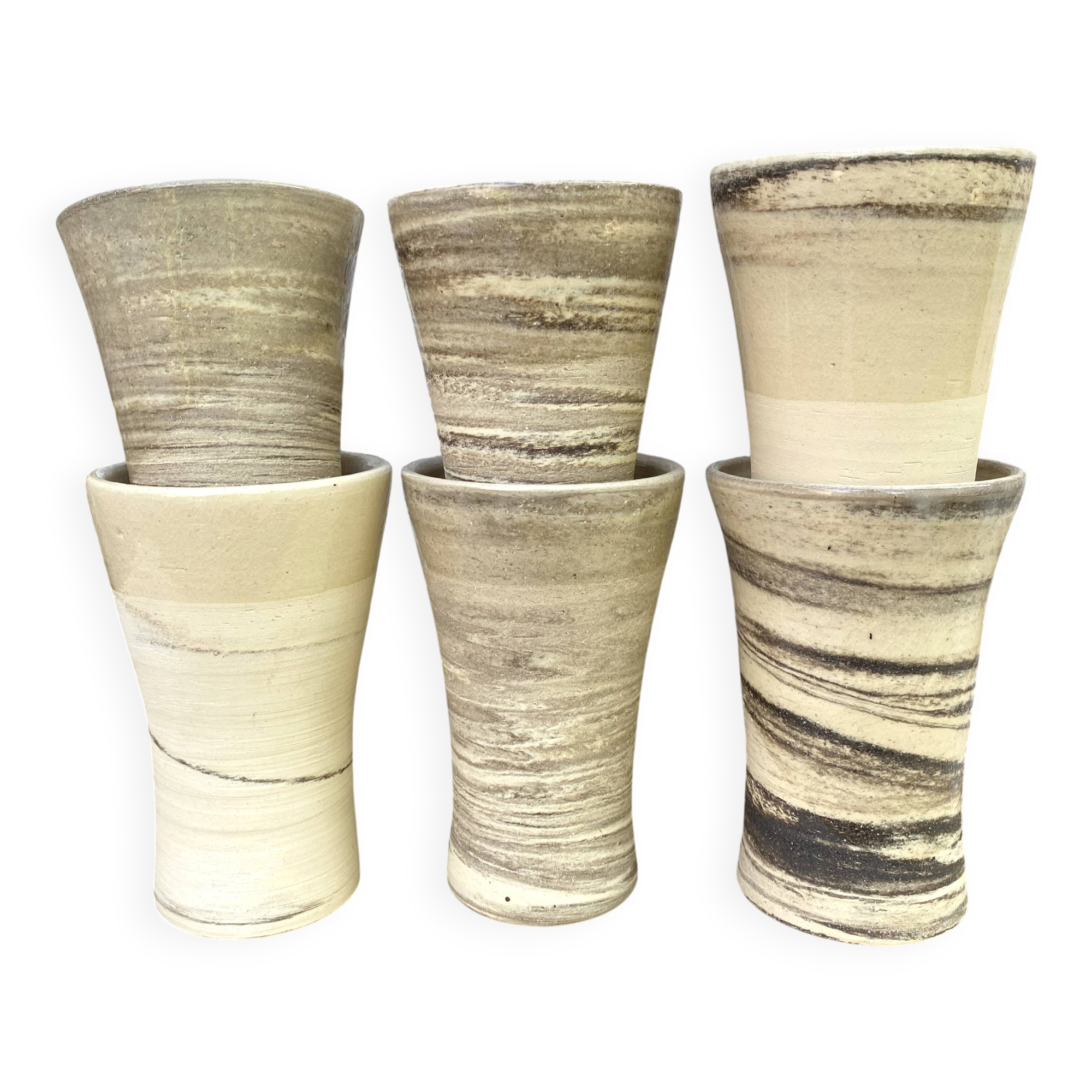 High ceramic cups made of mixed clay.