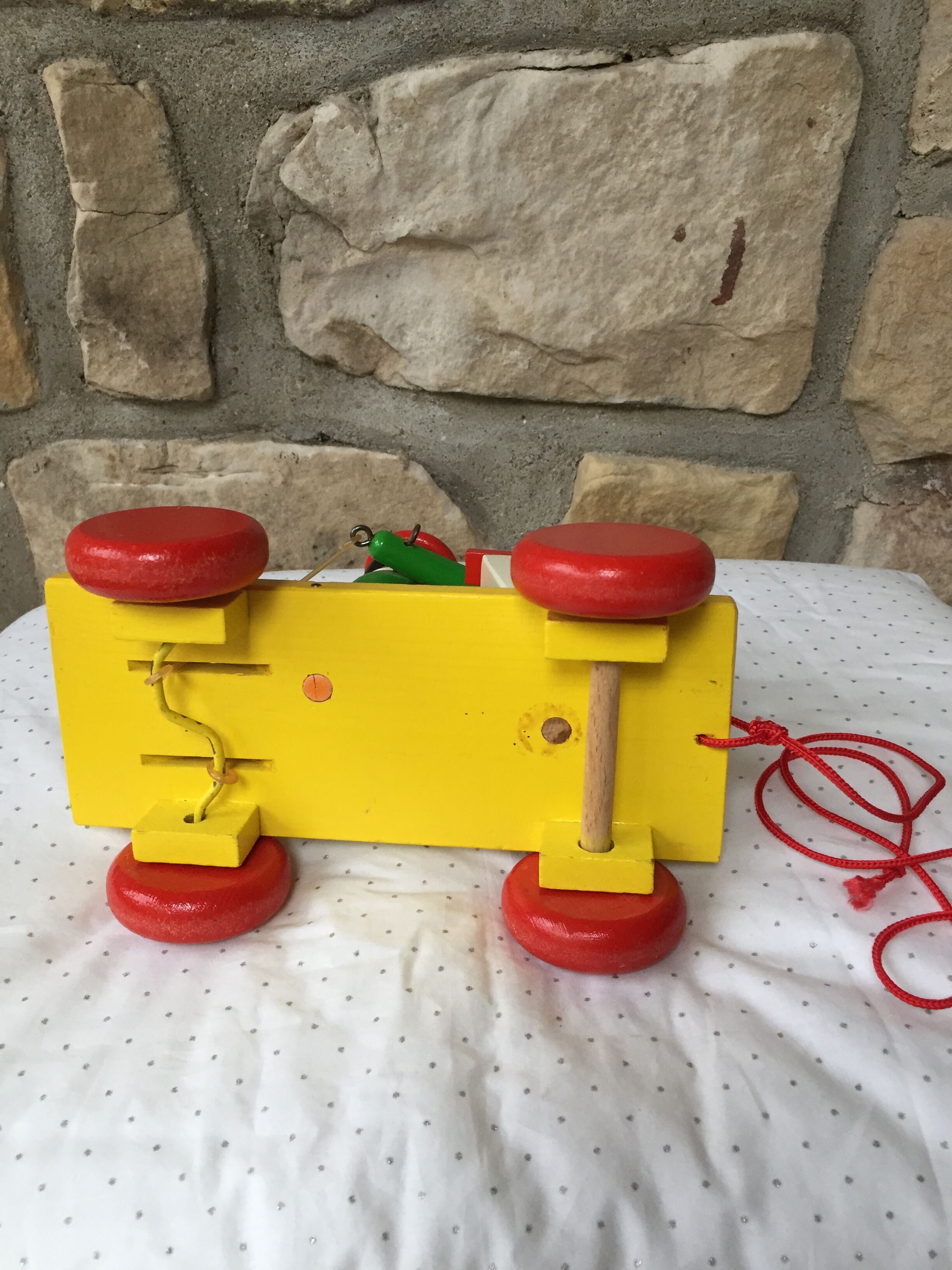 Old toy to pull Pinocchio and his xylophone