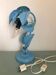 Ancienne lampe en forme plante en métal émaillé bleu