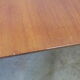 Mahogany round table with 4 extensions from the 1950s