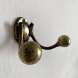 Antique double coat hook in solid brass